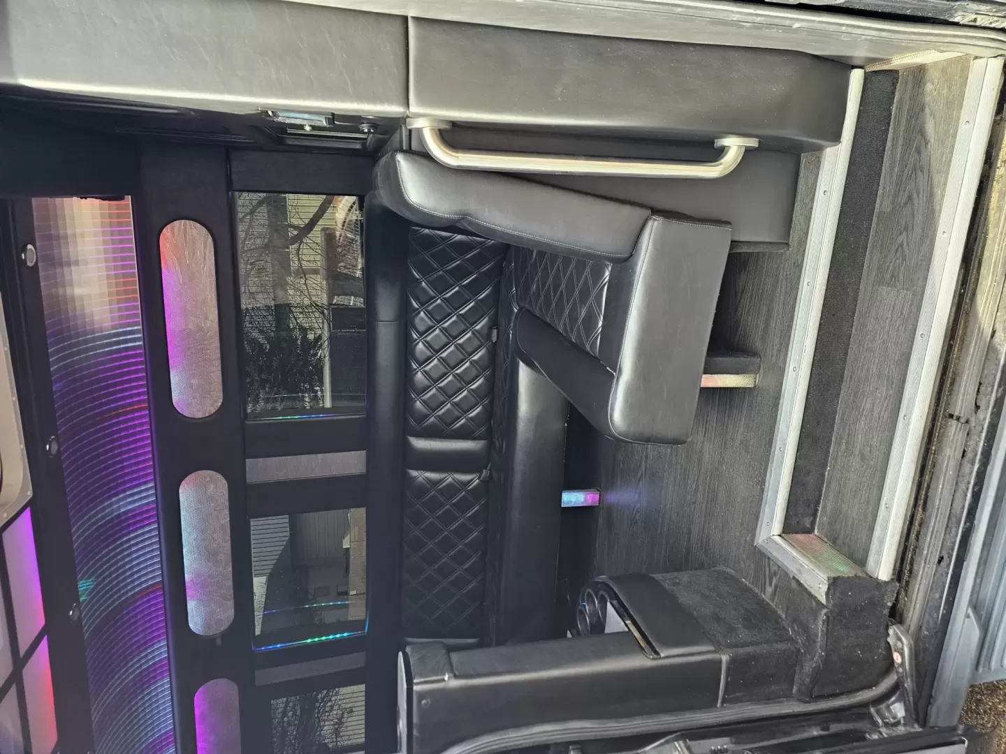 2017 Black /Black Ford Transit with an Gas engine, Auto transmission, 0.000000, 0.000000 - 2017 FORD TRANSIT 3.7L GAS ENGINE BUILT BY PINNICALE INTERIOR BLACK DIAMOND PATTERN LIMO BENCH SEATS 10 PASSENGERS PLUS DRIVER AND COPILOT - RACK LIMO BENCH SEATING POWER PARTITION TV'S FRONT AND REAR COVED RGB LIGHTING ON SIDE WALLS OVER HEAD DOME LIGHTS GRAY WOOD LOOK FLOORING MAYBACH CEILING LIGH - Photo#7