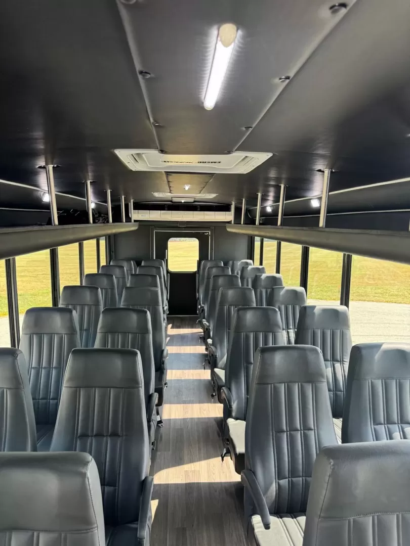 2023 Black /Gray Ford F550 with an 7.3 V8 engine, Auto transmission, 0.000000, 0.000000 - 2023 Ford F550 32 Passengers 7.3 V8 Gas White Exterior High Back Seats w/ Armrest, Lap Belts and seat Sliders USB Power Ports Backup Camera in Rear View Mirror Tires Like New Overhead Luggage Rear Luggage "Door" (2) Escape Hatches Full Heat and A/C Wood Look Flooring LIKE NEW - ONE OWNER Located in - Photo#4