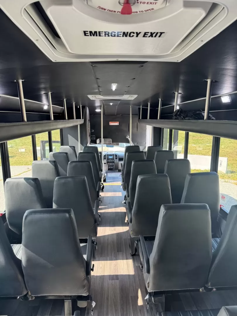 2023 Black /Gray Ford F550 with an 7.3 V8 engine, Auto transmission, 0.000000, 0.000000 - 2023 Ford F550 32 Passengers 7.3 V8 Gas White Exterior High Back Seats w/ Armrest, Lap Belts and seat Sliders USB Power Ports Backup Camera in Rear View Mirror Tires Like New Overhead Luggage Rear Luggage "Door" (2) Escape Hatches Full Heat and A/C Wood Look Flooring LIKE NEW - ONE OWNER Located in - Photo#5