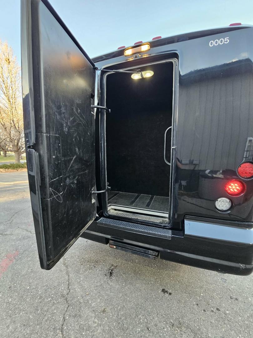 2012 Black /Black Ford E450 with an V8 engine, Auto transmission, 0.000000, 0.000000 - 2012 E450 TURTLE TOP BUS BODY INTERIOR BY FIRST CLASS COACHWORKS V8 GAS 5.4L ENGINE 20 REAR PASSENGER BLACK & GRAY LIMO BENCH SEATING DRIVER AND PASSENGER SIDE IN SEAT BARS WITH ACRYLIC BACK LED LIGHTING ACRYLIC LED LIGHTING IN THE CEILING , SIDE PANELS AND THE FRONT AND BACK WALLS CUSTOM LIGHTED FL - Photo#16