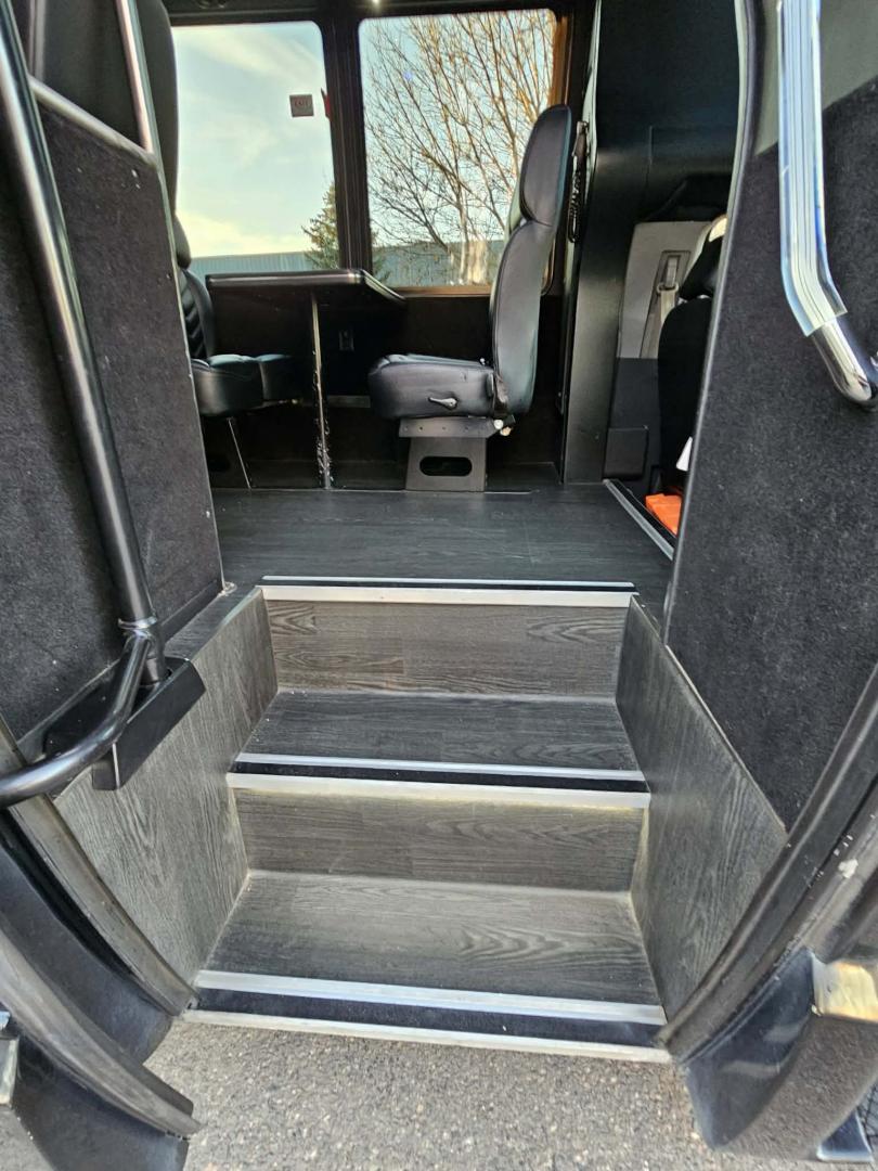 2012 Black /Black Ford E450 with an V8 engine, Auto transmission, 0.000000, 0.000000 - 2012 E450 TURTLE TOP BUS BODY INTERIOR BY FIRST CLASS COACHWORKS V8 GAS 5.4L ENGINE 20 REAR PASSENGER BLACK & GRAY LIMO BENCH SEATING DRIVER AND PASSENGER SIDE IN SEAT BARS WITH ACRYLIC BACK LED LIGHTING ACRYLIC LED LIGHTING IN THE CEILING , SIDE PANELS AND THE FRONT AND BACK WALLS CUSTOM LIGHTED FL - Photo#20