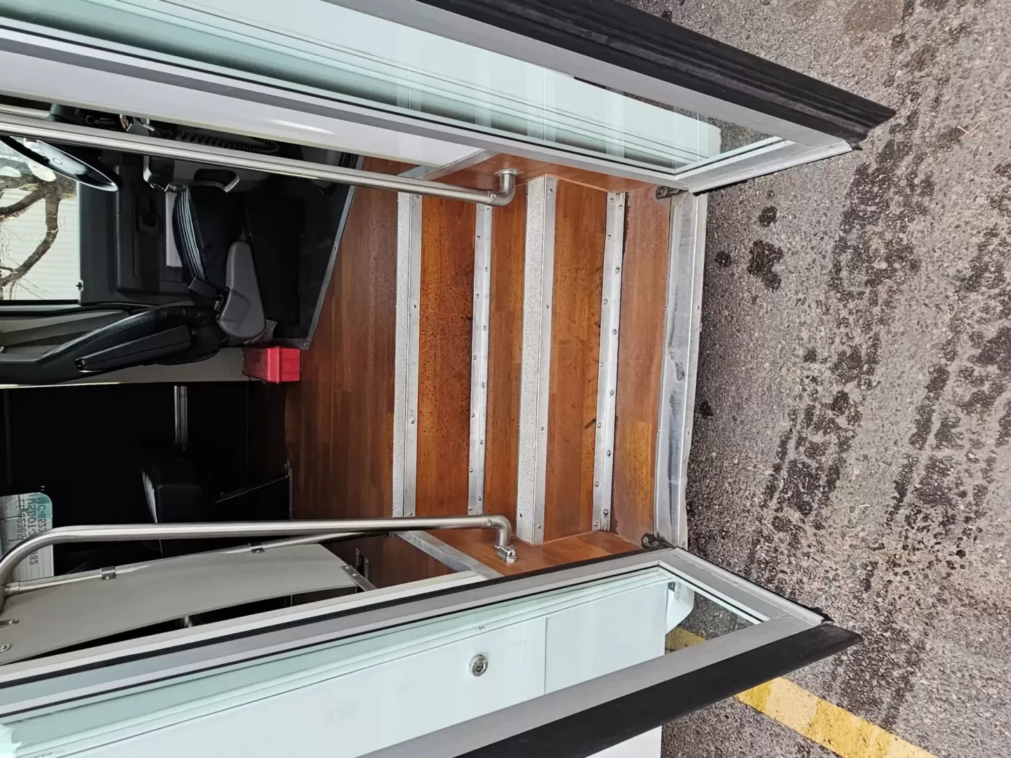 2015 White /Black Ford E450 with an V10 engine, Auto transmission, 0.000000, 0.000000 - 2015 FORD E450 CHAMPION - CHALLENGER V-10 GAS 24 PASSENGER PLUS DRIVER WHITE EXTERIOR EXECUTIVE SHUTTLE BLACK EXECUTIVE SEATS AISLE ARMREST LAP BELTS RECLINER SEATS WOOD LOOK FLOORING REAR LUGGAGE AND MUCH MORE! - WELL MAINTAINED FINANCING AVAILABLE LOCATED IN FT COLLINS - Photo#6