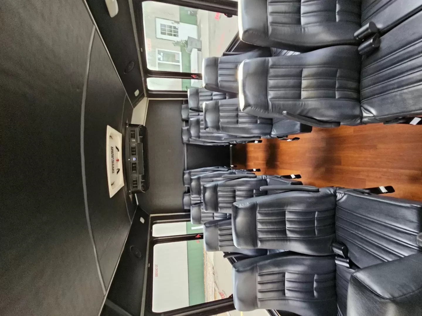 2015 White /Black Ford E450 with an V10 engine, Auto transmission, 0.000000, 0.000000 - 2015 FORD E450 CHAMPION - CHALLENGER V-10 GAS 24 PASSENGER PLUS DRIVER WHITE EXTERIOR EXECUTIVE SHUTTLE BLACK EXECUTIVE SEATS AISLE ARMREST LAP BELTS RECLINER SEATS WOOD LOOK FLOORING REAR LUGGAGE AND MUCH MORE! - WELL MAINTAINED FINANCING AVAILABLE LOCATED IN FT COLLINS - Photo#11