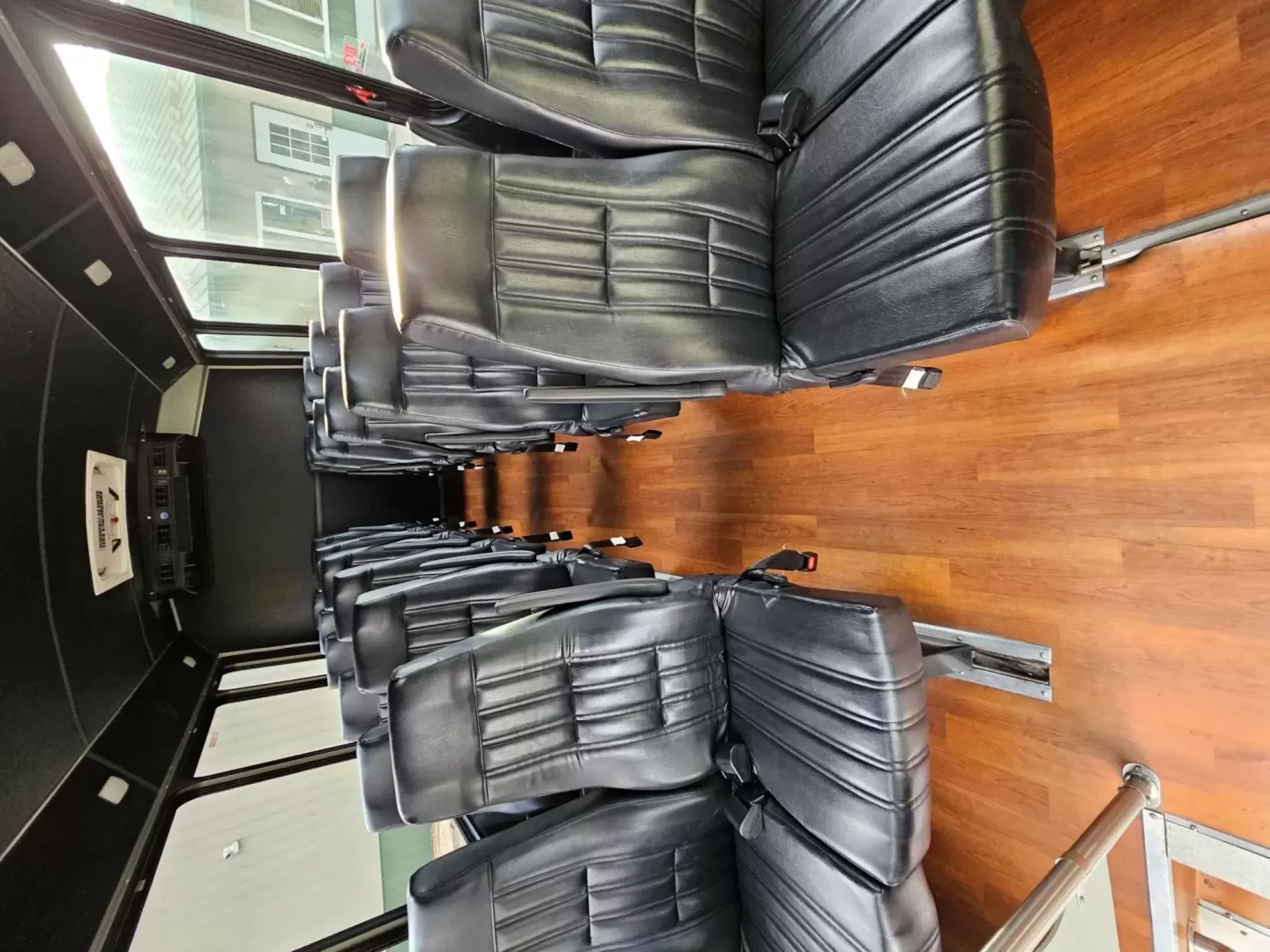 2015 White /Black Ford E450 with an V10 engine, Auto transmission, 0.000000, 0.000000 - 2015 FORD E450 CHAMPION - CHALLENGER V-10 GAS 24 PASSENGER PLUS DRIVER WHITE EXTERIOR EXECUTIVE SHUTTLE BLACK EXECUTIVE SEATS AISLE ARMREST LAP BELTS RECLINER SEATS WOOD LOOK FLOORING REAR LUGGAGE AND MUCH MORE! - WELL MAINTAINED FINANCING AVAILABLE LOCATED IN FT COLLINS - Photo#10