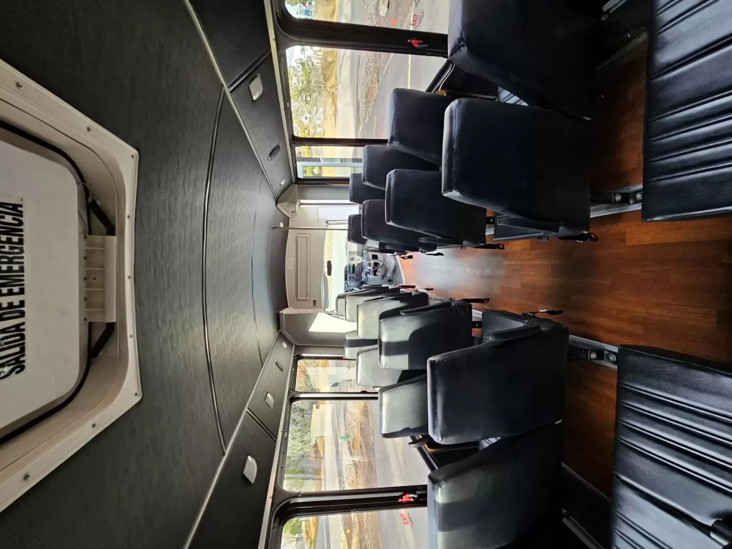 2015 White /Black Ford E450 with an V10 engine, Auto transmission, 0.000000, 0.000000 - 2015 FORD E450 CHAMPION - CHALLENGER V-10 GAS 24 PASSENGER PLUS DRIVER WHITE EXTERIOR EXECUTIVE SHUTTLE BLACK EXECUTIVE SEATS AISLE ARMREST LAP BELTS RECLINER SEATS WOOD LOOK FLOORING REAR LUGGAGE AND MUCH MORE! - WELL MAINTAINED FINANCING AVAILABLE LOCATED IN FT COLLINS - Photo#12