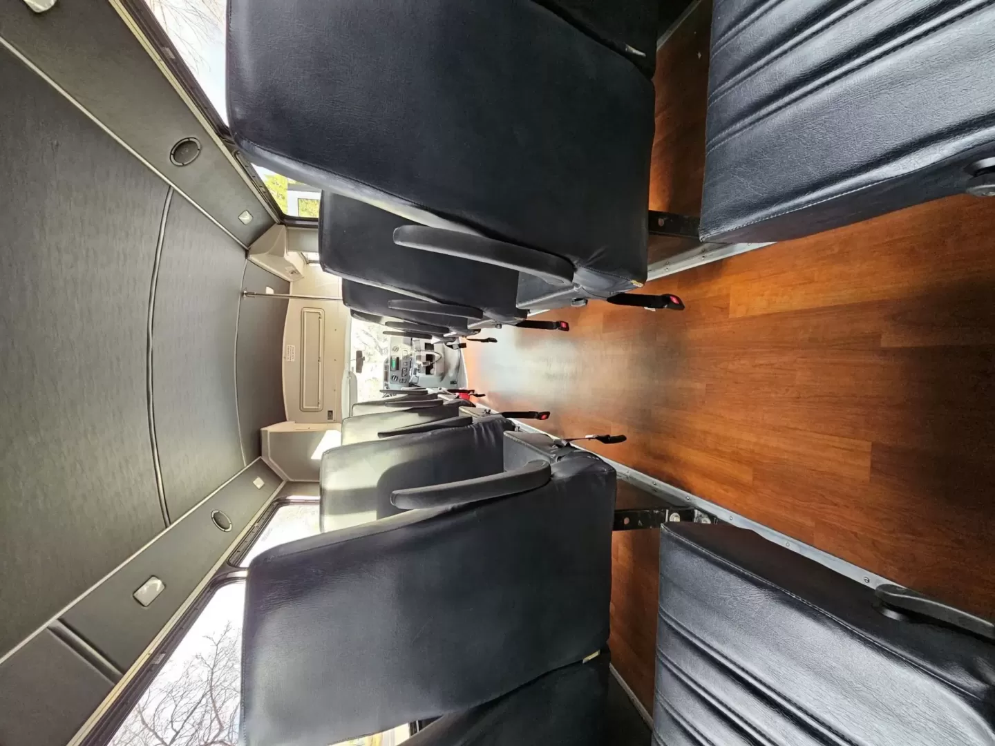 2015 White /Black Ford E450 with an V10 engine, Auto transmission, 0.000000, 0.000000 - 2015 FORD E450 CHAMPION - CHALLENGER V-10 GAS 24 PASSENGER PLUS DRIVER WHITE EXTERIOR EXECUTIVE SHUTTLE BLACK EXECUTIVE SEATS AISLE ARMREST LAP BELTS RECLINER SEATS WOOD LOOK FLOORING REAR LUGGAGE AND MUCH MORE! - WELL MAINTAINED FINANCING AVAILABLE LOCATED IN FT COLLINS - Photo#13