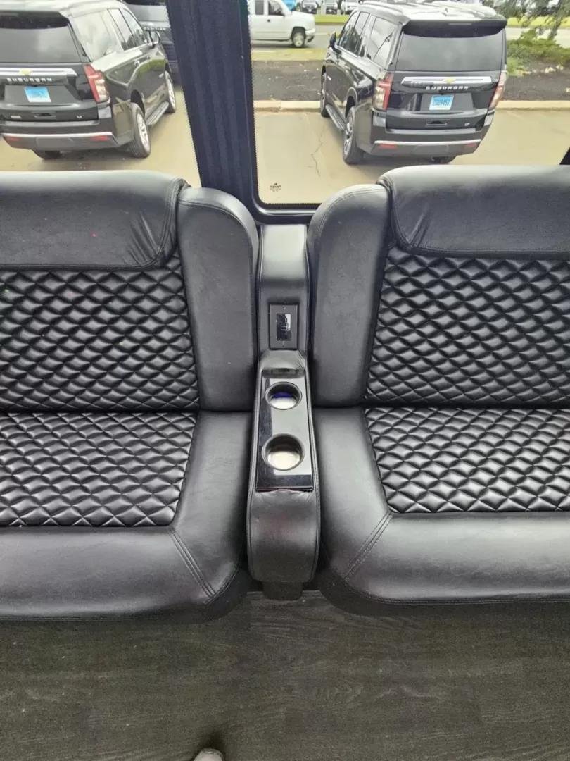 2016 White /Black Ford F550 with an Diesel engine, Auto transmission, 0.000000, 0.000000 - 2016 GRECH F550 GM33 LIMO DIESEL WHITE / BLACK NEW DIAMOND STITCHED SEATS NEW TURBO NEW DEF NEW WATER PUMP NEW EXHAUST NEW BATTERYLIMO STYLE SEATS AND BAR ULTRA RIDE AIR SYSTEM FRAMELESS COACH WINDOWS PREMIUM SOUND SYSTEM WOOD LOOK FLOORING LED INTERIOR LIGHTING ELECTRIC PLUG DOOR AND MUCH MORE! STI - Photo#13