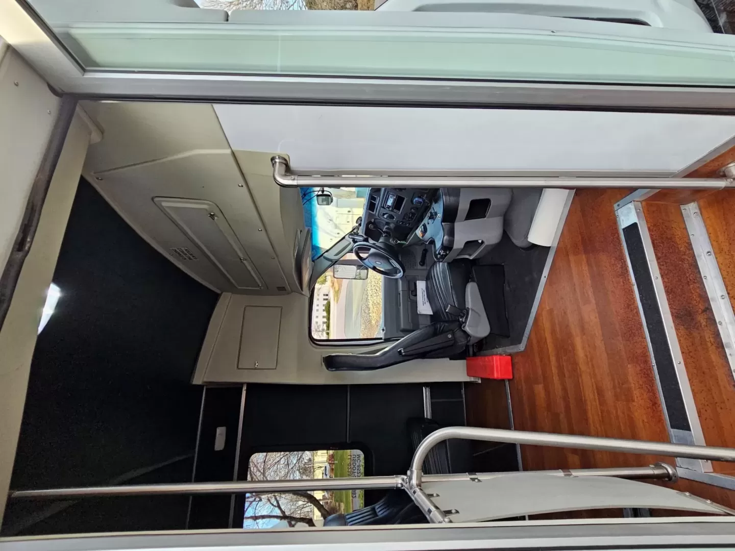 2015 White /Black Ford E450 with an V10 engine, Auto transmission, 0.000000, 0.000000 - 2015 FORD E450 CHAMPION - CHALLENGER V-10 GAS 24 PASSENGER PLUS DRIVER WHITE EXTERIOR EXECUTIVE SHUTTLE BLACK EXECUTIVE SEATS AISLE ARMREST LAP BELTS RECLINER SEATS WOOD LOOK FLOORING REAR LUGGAGE AND MUCH MORE! SIDE PANEL DRIVERS SIDE DAMAGE LOW MILES - WELL MAINTAINED FINANCING AVAILABLE LOCATED I - Photo#9