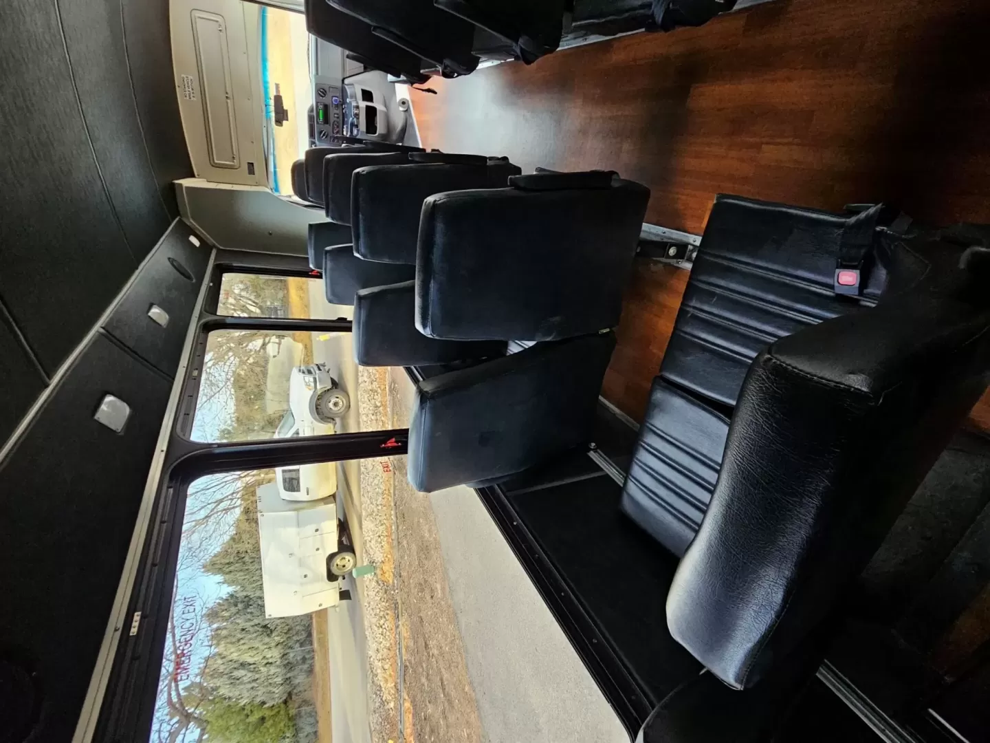 2015 White /Black Ford E450 with an V10 engine, Auto transmission, 0.000000, 0.000000 - 2015 FORD E450 CHAMPION - CHALLENGER V-10 GAS 24 PASSENGER PLUS DRIVER WHITE EXTERIOR EXECUTIVE SHUTTLE BLACK EXECUTIVE SEATS AISLE ARMREST LAP BELTS RECLINER SEATS WOOD LOOK FLOORING REAR LUGGAGE AND MUCH MORE! SIDE PANEL DRIVERS SIDE DAMAGE LOW MILES - WELL MAINTAINED FINANCING AVAILABLE LOCATED I - Photo#6