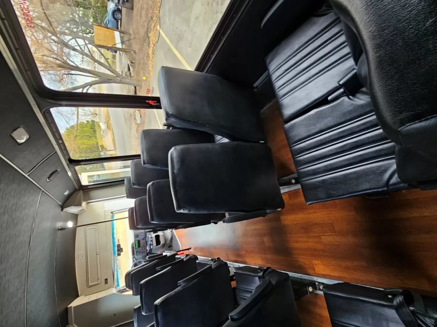 2015 White /Black Ford E450 with an V10 engine, Auto transmission, 0.000000, 0.000000 - 2015 FORD E450 CHAMPION - CHALLENGER V-10 GAS 24 PASSENGER PLUS DRIVER WHITE EXTERIOR EXECUTIVE SHUTTLE BLACK EXECUTIVE SEATS AISLE ARMREST LAP BELTS RECLINER SEATS WOOD LOOK FLOORING REAR LUGGAGE AND MUCH MORE! SIDE PANEL DRIVERS SIDE DAMAGE LOW MILES - WELL MAINTAINED FINANCING AVAILABLE LOCATED I - Photo#13