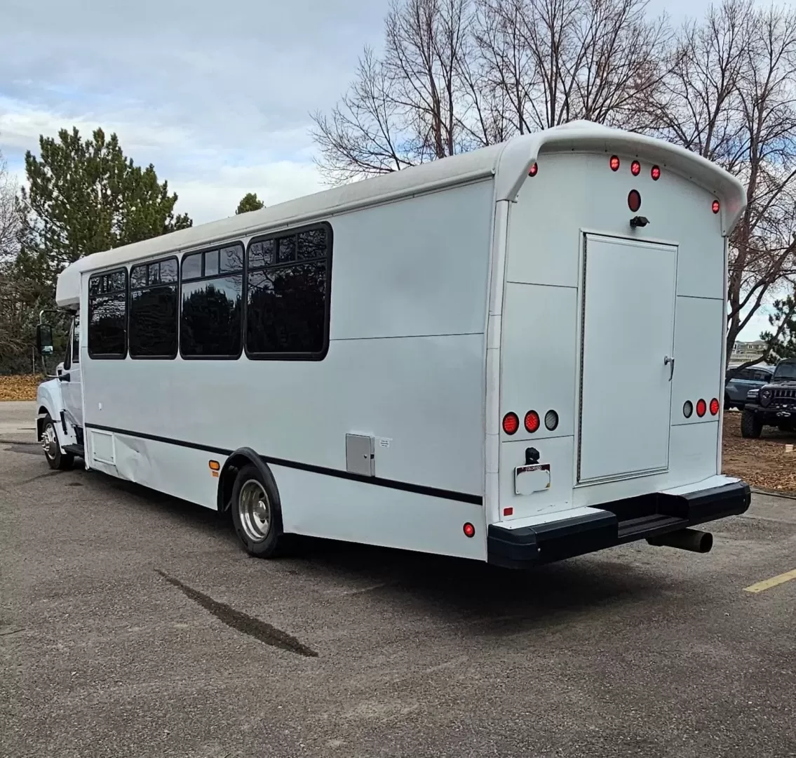 2013 White /Black IC PC805 with an Diesel engine, Allison transmission, 0.000000, 0.000000 - 2013 IC BUS MODEL - PC805 MAXXFORCE 6.4L DIESEL ENGINE ALLISON LIMO CONVERSION BY GLOBAL MOTORS (3YEARS OLD) BLACK / BLACK 28 PASSENGERS PLUS DRIVER SLIDING PARTITION BEHIND DRIVER LIMO BENCH SEATING CUP HOLDERS BEHIND SEATS RGB LIGHTING WOOD LOOK FLOORING TV'S FRONT AND REAR WALL SELF DRAINING ICE - Photo#2