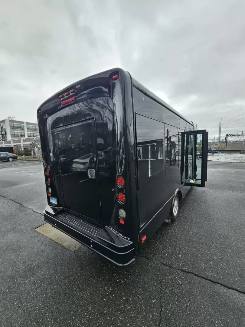2020 Black /Black Ford Transit with an Gas engine, Auto transmission, 0.000000, 0.000000 - 2020 FORD TRANSIT STARCRAFT BUS W/ BATTISTI CUSTOMS LIMO INTERIOR 3.5L (6) CYLINDER - GAS ENGINE RWD BY-FOLD ENTRY DOOR INTERIOR BLACK DIAMOND PATTERN LIMO BENCH SEATS W/ LAP BELTS FOR 14 PASSENGERS - PLUS DRIVER TV' REAR RGB LIGHTING ON REAR WALL AND CEILING INSERT OVERHEAD DOME LIGHTS OVERHEAD GRA - Photo#3
