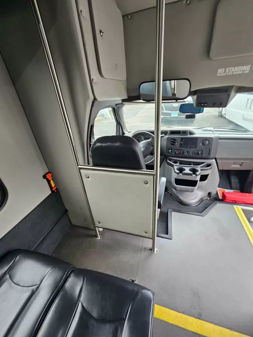 2019 White /Black Ford E450 with an V10 engine, Auto transmission, 0.000000, 0.000000 - 2019 FORD E450 STARCRAFT WHITE EXTERIOR 6.8L V10 GAS ENGINE 25 PASSENGERS GRAY RUBBER FLOORING TRANS AIR REAR A/C SYSTEM FLOOR HEATER NEW BLACK HIGH BACK SEATS, W/ RECLINE, RETRACTABLE LAP BELTS, SEAT SIDE SLIDERS AND ARMRESTS REAR LUGGAGE (DOOR) NO LUGGAGE SPACE CENTER MOUNT FLIP DOWN TV'S (2) BACK - Photo#16