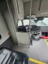 2019 White /Black Ford E450 with an V10 engine, Auto transmission, 0.000000, 0.000000 - 2019 FORD E450 STARCRAFT WHITE EXTERIOR 6.8L V10 GAS ENGINE 25 PASSENGERS GRAY RUBBER FLOORING TRANS AIR REAR A/C SYSTEM FLOOR HEATER NEW BLACK HIGH BACK SEATS, W/ RECLINE, RETRACTABLE LAP BELTS, SEAT SIDE SLIDERS AND ARMRESTS REAR LUGGAGE (DOOR) NO LUGGAGE SPACE CENTER MOUNT FLIP DOWN TV'S (2) BACK - Photo#16