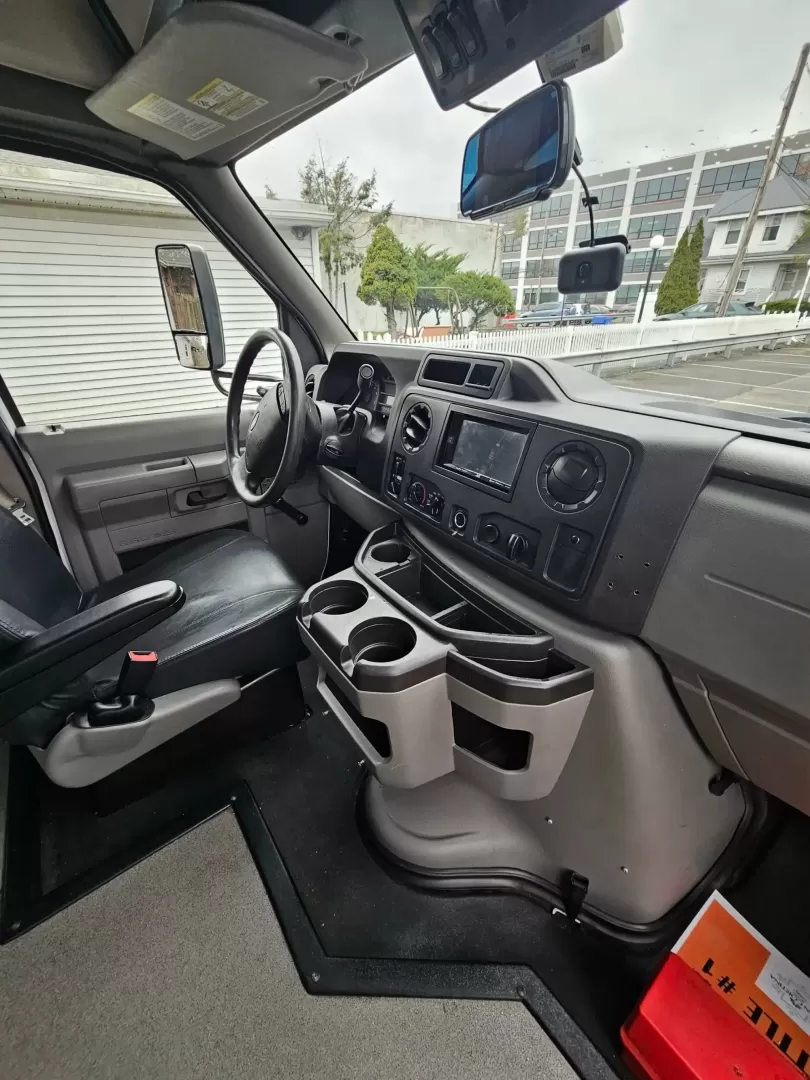 2019 White /Black Ford E450 with an V10 engine, Auto transmission, 0.000000, 0.000000 - 2019 FORD E450 STARCRAFT WHITE EXTERIOR 6.8L V10 GAS ENGINE 25 PASSENGERS GRAY RUBBER FLOORING TRANS AIR REAR A/C SYSTEM FLOOR HEATER NEW BLACK HIGH BACK SEATS, W/ RECLINE, RETRACTABLE LAP BELTS, SEAT SIDE SLIDERS AND ARMRESTS REAR LUGGAGE (DOOR) NO LUGGAGE SPACE CENTER MOUNT FLIP DOWN TV'S (2) BACK - Photo#9
