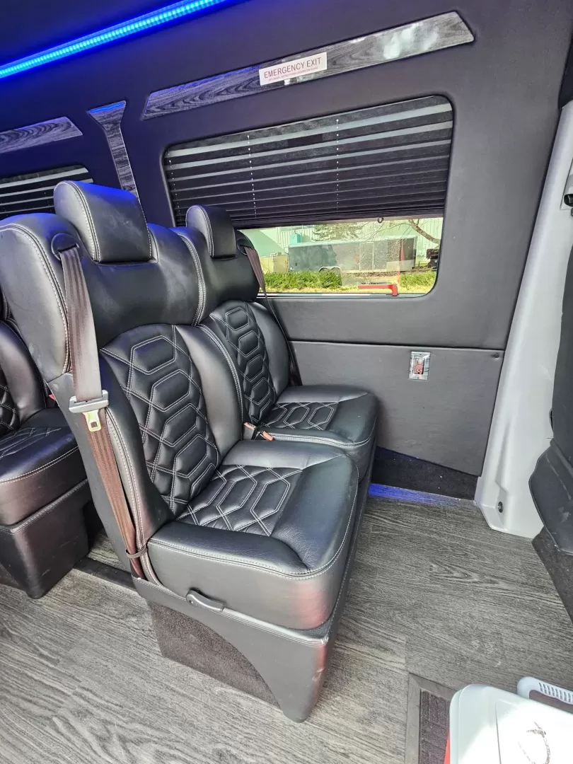 2018 Black /Black Mercedes-Benz Sprinter 3500 with an Gas engine, Auto transmission, 0.000000, 0.000000 - 2018 Mercedes Benz Sprinter Grech Executive Shuttle 3500 Ext -Black / Black 13 Rear passengers Plus Driver and Co-Pilot Front TV Pro Air - Heat and A/C System Grech Sound System and Controls Grey Wood Look Flooring Rear Row Stadium Seating Rear Luggage with Under Seat Storage Window Shades USB Power - Photo#14