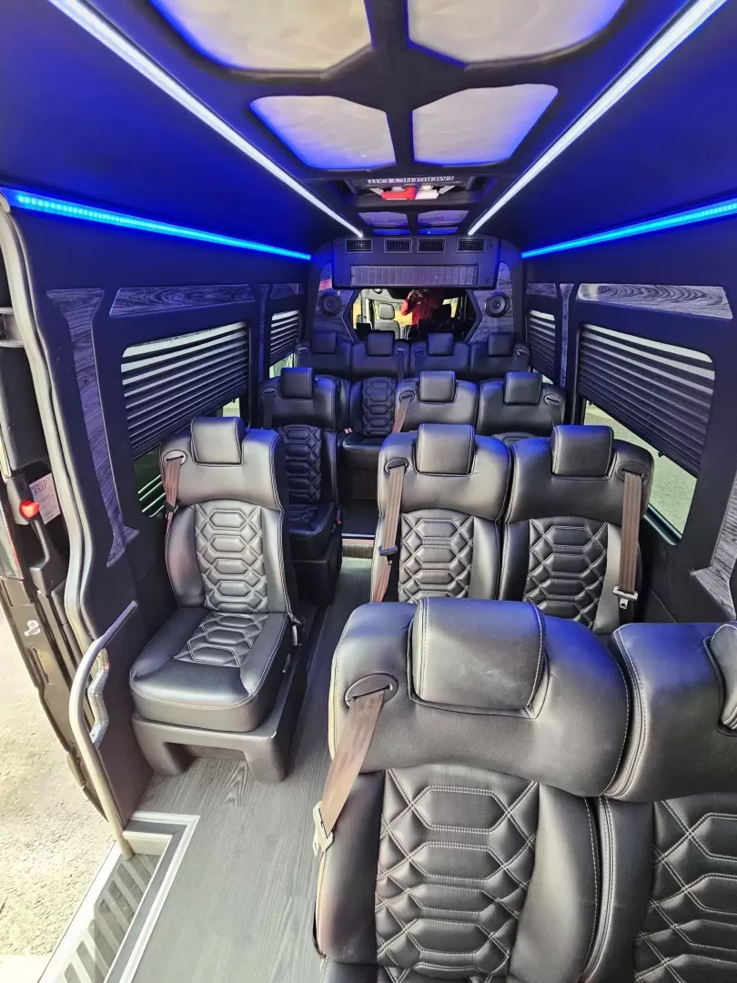 2018 Black /Black Mercedes-Benz Sprinter 3500 with an Gas engine, Auto transmission, 0.000000, 0.000000 - 2018 Mercedes Benz Sprinter Grech Executive Shuttle 3500 Ext -Black / Black 13 Rear passengers Plus Driver and Co-Pilot Front TV Pro Air - Heat and A/C System Grech Sound System and Controls Grey Wood Look Flooring Rear Row Stadium Seating Rear Luggage with Under Seat Storage Window Shades USB Power - Photo#17