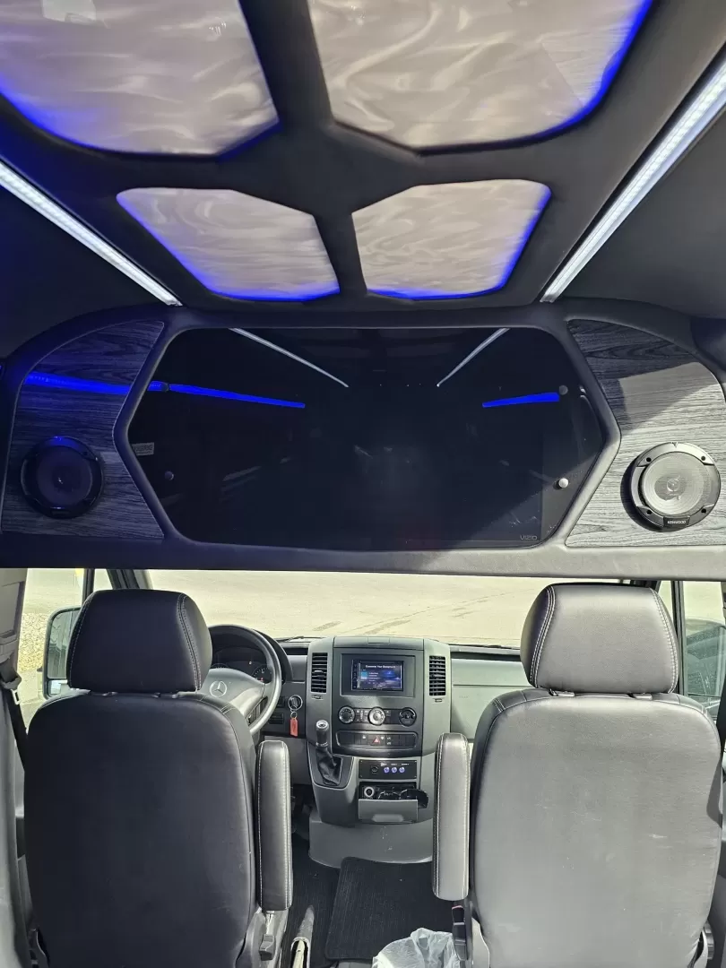 2018 Black /Black Mercedes-Benz Sprinter 3500 with an Gas engine, Auto transmission, 0.000000, 0.000000 - 2018 Mercedes Benz Sprinter Grech Executive Shuttle 3500 Ext -Black / Black 13 Rear passengers Plus Driver and Co-Pilot Front TV Pro Air - Heat and A/C System Grech Sound System and Controls Grey Wood Look Flooring Rear Row Stadium Seating Rear Luggage with Under Seat Storage Window Shades USB Power - Photo#26