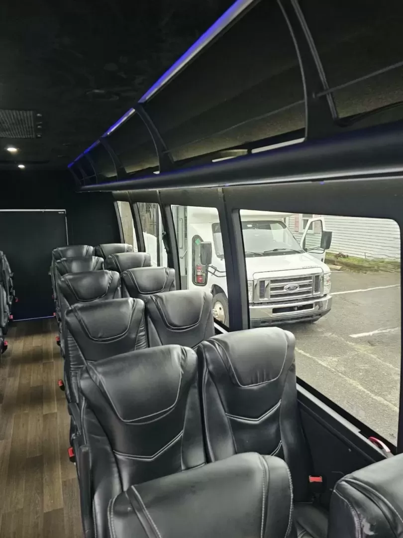2017 White /Black Ford E450 with an V10 engine, Auto transmission, 0.000000, 0.000000 - 2017 FORD E450 BERKSHIRE (EXECUTIVE STYLE) 6.8L GAS V-10 - 25 PASSENGERS GERFLOR WOOD LOOK FLOORING CEILING MOUNT HEAT AND A/C GRAY SUEDE CEILING WITH WHITE LIGHTS BLUE ACCENT LIGHTING BERKSHIRE SEATS: HIGH BACK RECLINERS RETRACTABLE SEAT BELTS AISLE ARMRESTS REAR FLIP SEATS TO ACCOMMODATE LUGGAGE R - Photo#16