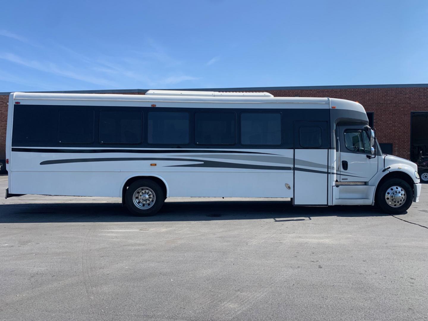 2012 White /Blue Freightliner M2 with an Diesel engine, Automatic transmission, 0.000000, 0.000000 - 2012 Freightliner M2 - 6.7L Cummins Diesel Engine - Automatic Trans - Electric Entrance Door - 34 Passengers & Driver - Mid Back Reclining Seats - Seat Belts- Aisle Sliders- Rear Dedicated Luggage - Aluminum Wheels - Front and Rear A/- Photo#1