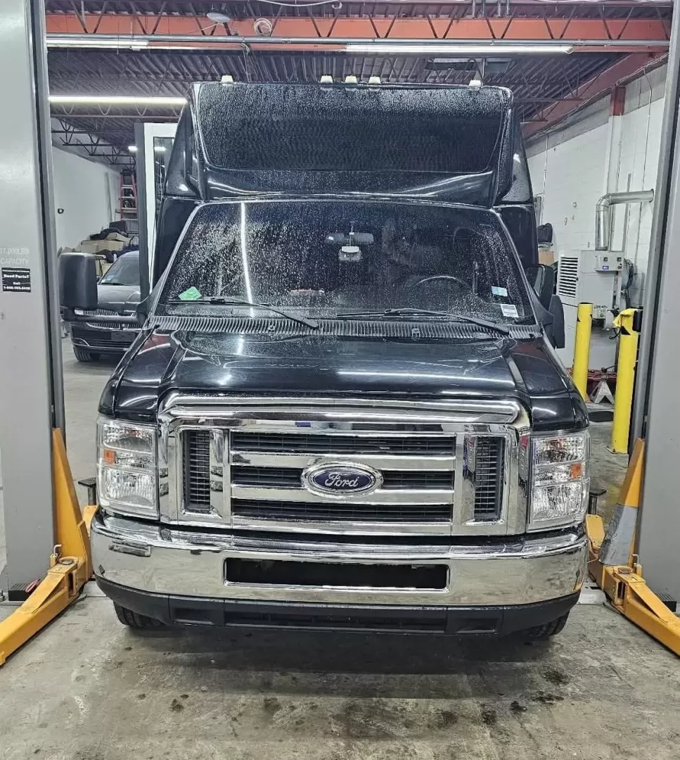 2017 Black /Black Ford E450 with an V10 engine, Automatic transmission, 0.000000, 0.000000 - 2017 FORD E450 FEDERAL COACH (EXECUTIVE STYLE) 6.8L V10 GAS ENGINE MILES -24 PASSENGERS WOOD LOOK FLOORING REAR HEAT AND A/C CEILING WITH WHITE LIGHTS WHITE ACCENT LIGHTING HIGH BACK RECLINERS RETRACTABLE SEAT BELTS AISLE ARMRESTS REAR LUGGAGE WALL AND DOOR REAR BUMPER STEP CLEARVIEW ESCAPE HATCH RE- Photo#2