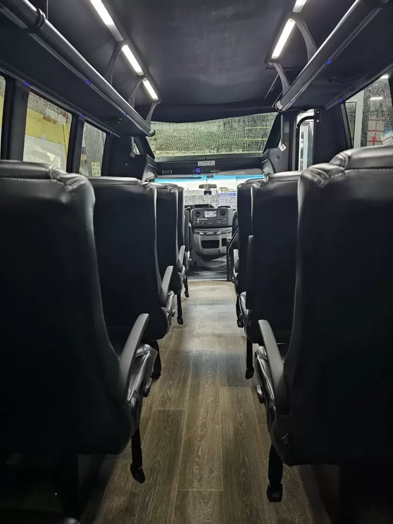 2017 Black /Black Ford E450 with an V10 engine, Automatic transmission, 0.000000, 0.000000 - 2017 FORD E450 FEDERAL COACH (EXECUTIVE STYLE) 6.8L V10 GAS ENGINE MILES -24 PASSENGERS WOOD LOOK FLOORING REAR HEAT AND A/C CEILING WITH WHITE LIGHTS WHITE ACCENT LIGHTING HIGH BACK RECLINERS RETRACTABLE SEAT BELTS AISLE ARMRESTS REAR LUGGAGE WALL AND DOOR REAR BUMPER STEP CLEARVIEW ESCAPE HATCH RE- Photo#3