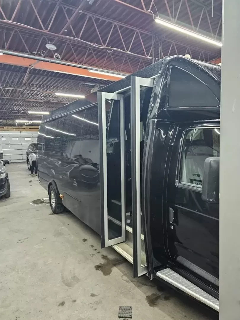 2017 Black /Black Ford E450 with an V10 engine, Automatic transmission, 0.000000, 0.000000 - 2017 FORD E450 FEDERAL COACH (EXECUTIVE STYLE) 6.8L V10 GAS ENGINE MILES -24 PASSENGERS WOOD LOOK FLOORING REAR HEAT AND A/C CEILING WITH WHITE LIGHTS WHITE ACCENT LIGHTING HIGH BACK RECLINERS RETRACTABLE SEAT BELTS AISLE ARMRESTS REAR LUGGAGE WALL AND DOOR REAR BUMPER STEP CLEARVIEW ESCAPE HATCH RE- Photo#6