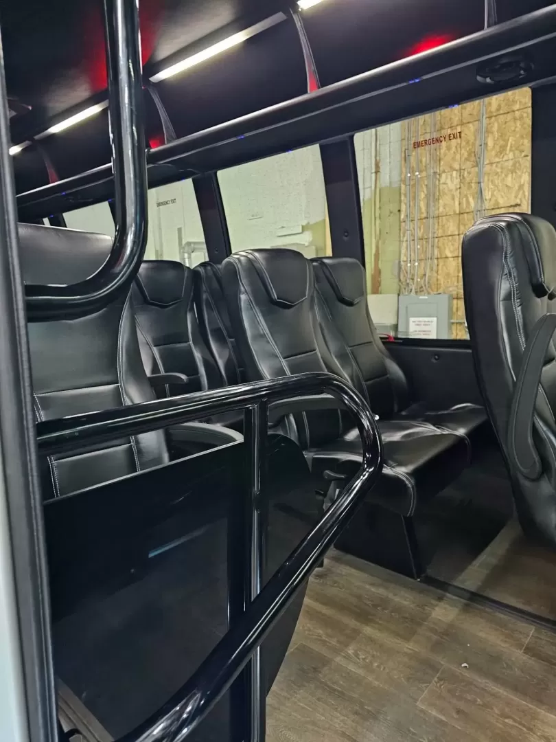 2017 Black /Black Ford E450 with an V10 engine, Automatic transmission, 0.000000, 0.000000 - 2017 FORD E450 FEDERAL COACH (EXECUTIVE STYLE) 6.8L V10 GAS ENGINE MILES -24 PASSENGERS WOOD LOOK FLOORING REAR HEAT AND A/C CEILING WITH WHITE LIGHTS WHITE ACCENT LIGHTING HIGH BACK RECLINERS RETRACTABLE SEAT BELTS AISLE ARMRESTS REAR LUGGAGE WALL AND DOOR REAR BUMPER STEP CLEARVIEW ESCAPE HATCH RE- Photo#9