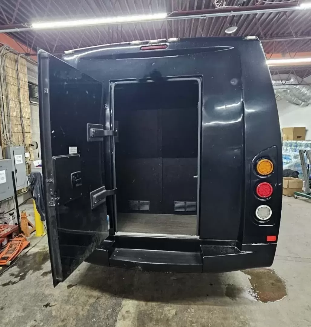 2017 Black /Black Ford E450 with an V10 engine, Automatic transmission, 0.000000, 0.000000 - 2017 FORD E450 FEDERAL COACH (EXECUTIVE STYLE) 6.8L V10 GAS ENGINE MILES -24 PASSENGERS WOOD LOOK FLOORING REAR HEAT AND A/C CEILING WITH WHITE LIGHTS WHITE ACCENT LIGHTING HIGH BACK RECLINERS RETRACTABLE SEAT BELTS AISLE ARMRESTS REAR LUGGAGE WALL AND DOOR REAR BUMPER STEP CLEARVIEW ESCAPE HATCH RE- Photo#10
