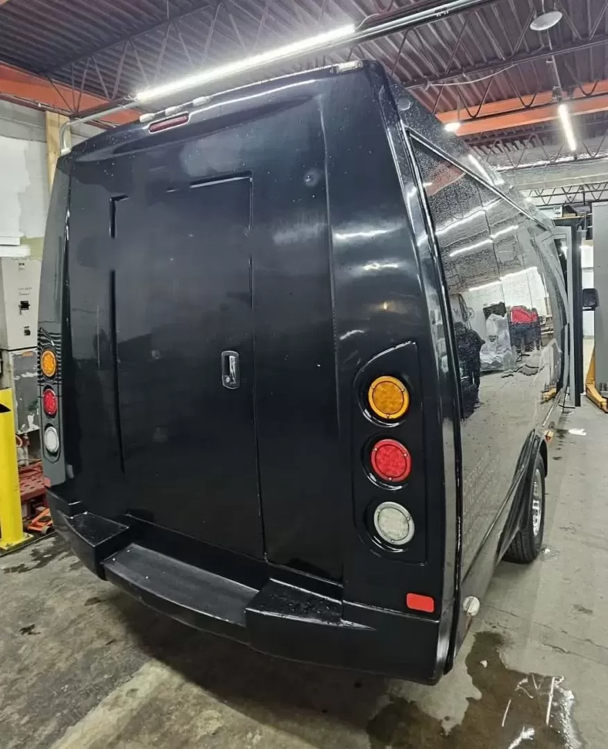 2017 Black /Black Ford E450 with an V10 engine, Automatic transmission, 0.000000, 0.000000 - 2017 FORD E450 FEDERAL COACH (EXECUTIVE STYLE) 6.8L V10 GAS ENGINE MILES -24 PASSENGERS WOOD LOOK FLOORING REAR HEAT AND A/C CEILING WITH WHITE LIGHTS WHITE ACCENT LIGHTING HIGH BACK RECLINERS RETRACTABLE SEAT BELTS AISLE ARMRESTS REAR LUGGAGE WALL AND DOOR REAR BUMPER STEP CLEARVIEW ESCAPE HATCH RE- Photo#11