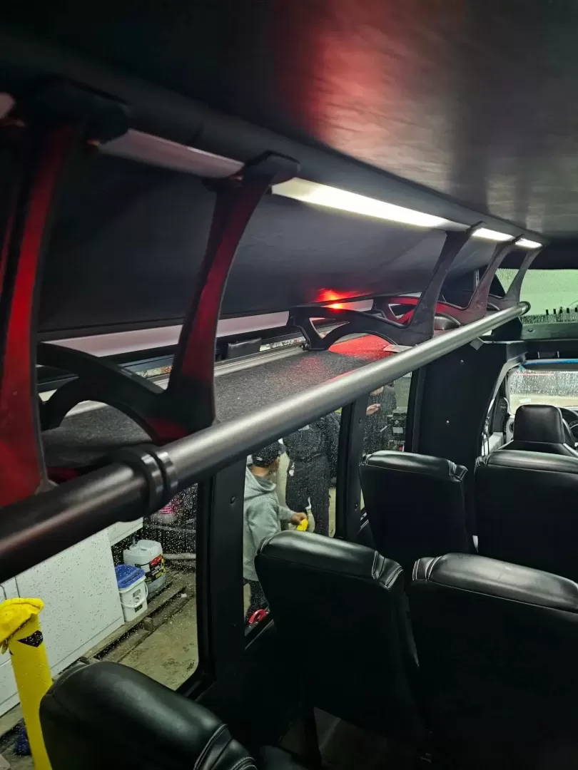 2017 Black /Black Ford E450 with an V10 engine, Automatic transmission, 0.000000, 0.000000 - 2017 FORD E450 FEDERAL COACH (EXECUTIVE STYLE) 6.8L V10 GAS ENGINE MILES -24 PASSENGERS WOOD LOOK FLOORING REAR HEAT AND A/C CEILING WITH WHITE LIGHTS WHITE ACCENT LIGHTING HIGH BACK RECLINERS RETRACTABLE SEAT BELTS AISLE ARMRESTS REAR LUGGAGE WALL AND DOOR REAR BUMPER STEP CLEARVIEW ESCAPE HATCH RE- Photo#12