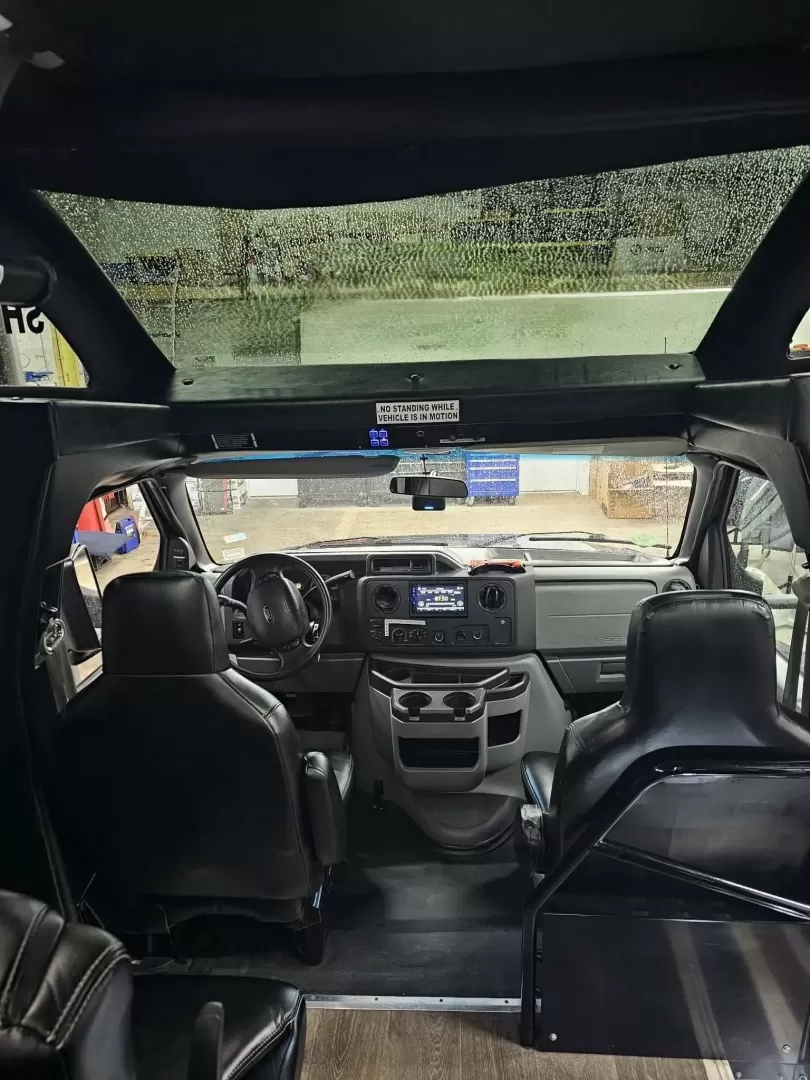 2017 Black /Black Ford E450 with an V10 engine, Automatic transmission, 0.000000, 0.000000 - 2017 FORD E450 FEDERAL COACH (EXECUTIVE STYLE) 6.8L V10 GAS ENGINE MILES -24 PASSENGERS WOOD LOOK FLOORING REAR HEAT AND A/C CEILING WITH WHITE LIGHTS WHITE ACCENT LIGHTING HIGH BACK RECLINERS RETRACTABLE SEAT BELTS AISLE ARMRESTS REAR LUGGAGE WALL AND DOOR REAR BUMPER STEP CLEARVIEW ESCAPE HATCH RE- Photo#14