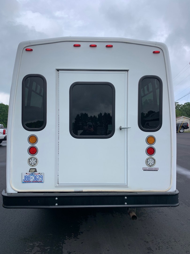 2010 Ford E450 with an V10 engine, Auto transmission, 0.000000, 0.000000 - 2010 Ford E-450 – Goshen Coach - 25 Passengers + Driver - 6.8L V10 Engine – Automatic - High Back Reclining Seats – Seat Belts -Electric Entrance Doors – Overhead Storage – Reading Lights – Front/Rear AC – Stainless Wheel Simulators,- Photo#3
