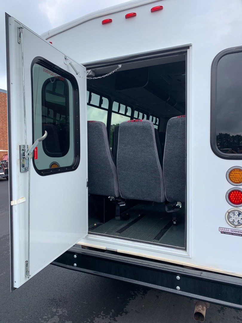 2010 Ford E450 with an V10 engine, Auto transmission, 0.000000, 0.000000 - 2010 Ford E-450 – Goshen Coach - 25 Passengers + Driver - 6.8L V10 Engine – Automatic - High Back Reclining Seats – Seat Belts -Electric Entrance Doors – Overhead Storage – Reading Lights – Front/Rear AC – Stainless Wheel Simulators,- Photo#4