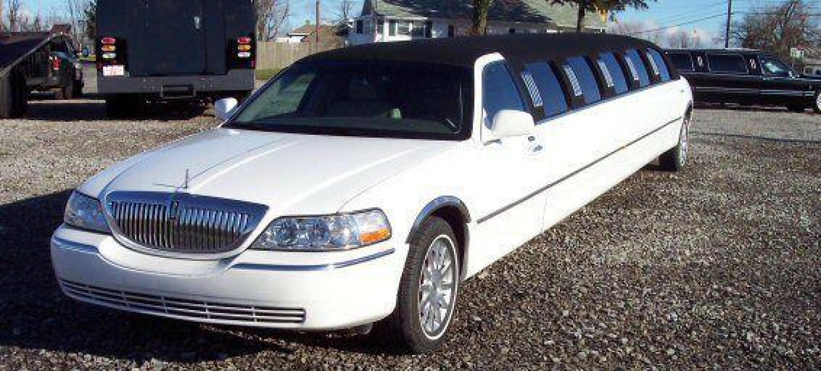 2006 White w/ Black (Tux) Lincoln Town Car (1LNHM81V06Y) with an V8, 4.6L; FFV; SOHC engine, located at 1725 US-68 N, Bellefontaine, OH, 43311, (937) 592-5466, 40.387783, -83.752388 - LINCOLN 180" SUPER STRETCH “5Dr”-AERGO "TUX “Edition” (White-Black Cloth Top) w-Lt. stone J-seat, deluxe black lacquered bar, mirrored fiber-optic ceiling, divider wall, & bar, 15” flat screen TV-AM-FM-CD-DVD-Karaoke, strobe-laser lights, champ-iceboxes, front-rear controls & dual alternat - Photo #0