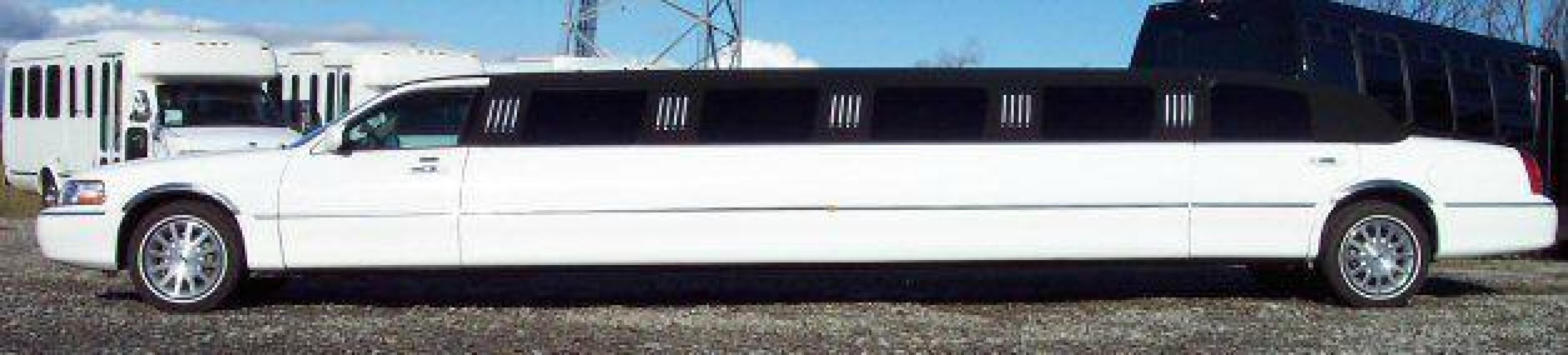 2006 White w/ Black (Tux) Lincoln Town Car (1LNHM81V06Y) with an V8, 4.6L; FFV; SOHC engine, located at 1725 US-68 N, Bellefontaine, OH, 43311, (937) 592-5466, 40.387783, -83.752388 - LINCOLN 180" SUPER STRETCH “5Dr”-AERGO "TUX “Edition” (White-Black Cloth Top) w-Lt. stone J-seat, deluxe black lacquered bar, mirrored fiber-optic ceiling, divider wall, & bar, 15” flat screen TV-AM-FM-CD-DVD-Karaoke, strobe-laser lights, champ-iceboxes, front-rear controls & dual alternat - Photo #2