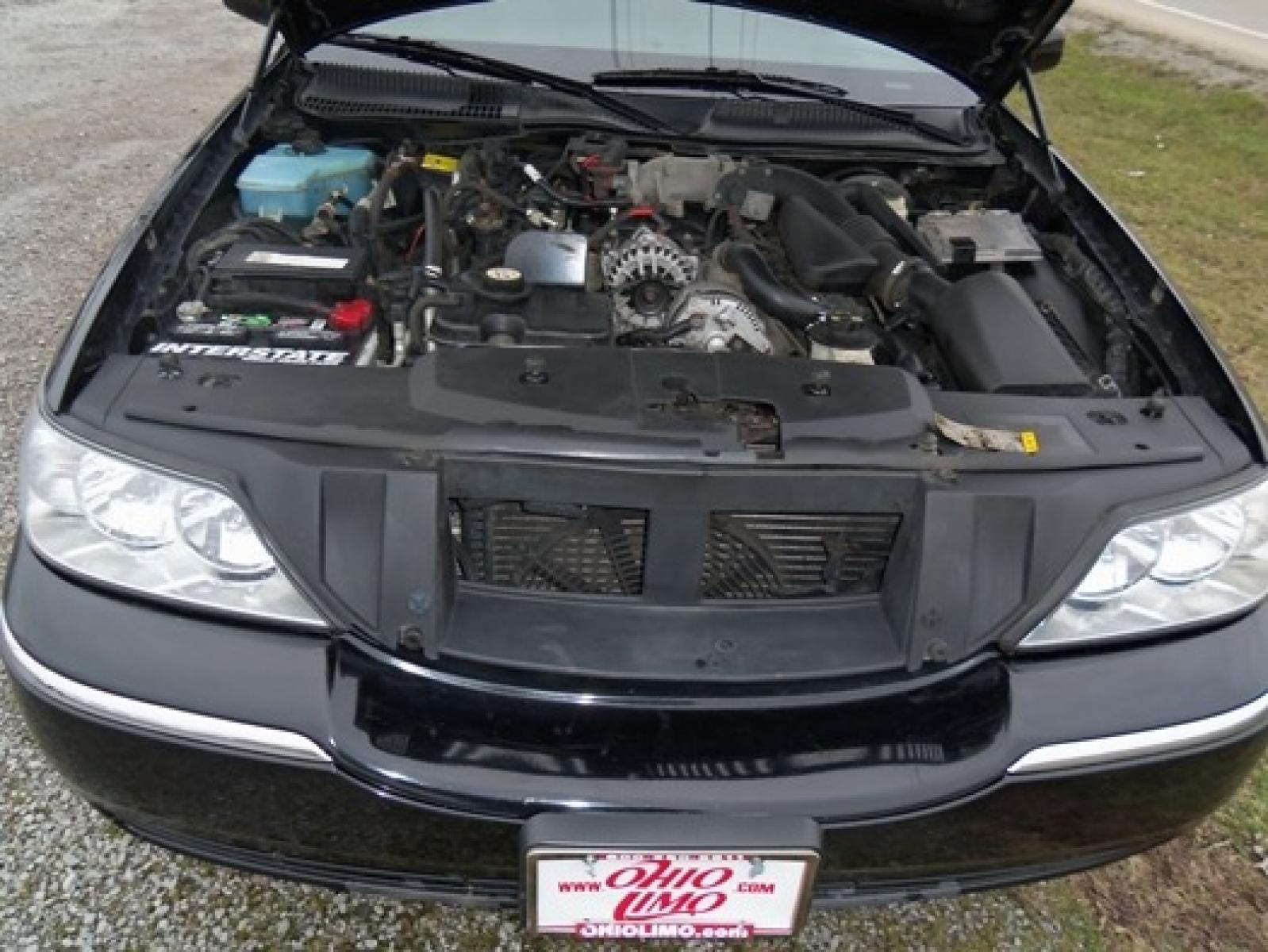 2006 Black Lincoln Town Car (1L1FM88W66Y) with an 4.6-Liter 8 Cylinder Engine engine, located at 1725 US-68 N, Bellefontaine, OH, 43311, (937) 592-5466, 40.387783, -83.752388 - 2006 LINCOLN 120” SUPER STRETCH “5DR”-FEDERAL LIMOUSINE, BLACK-black leather 3-Seat int., AM-FM-CD-DVD, 13” TV, power ports, mood lighting, electric divider, deluxe wood hideaway bar w-extra mini bar &glassware, ice-champagne wells front & rear controls, trash chute. Signature Chrome, 1 Own - Photo #11