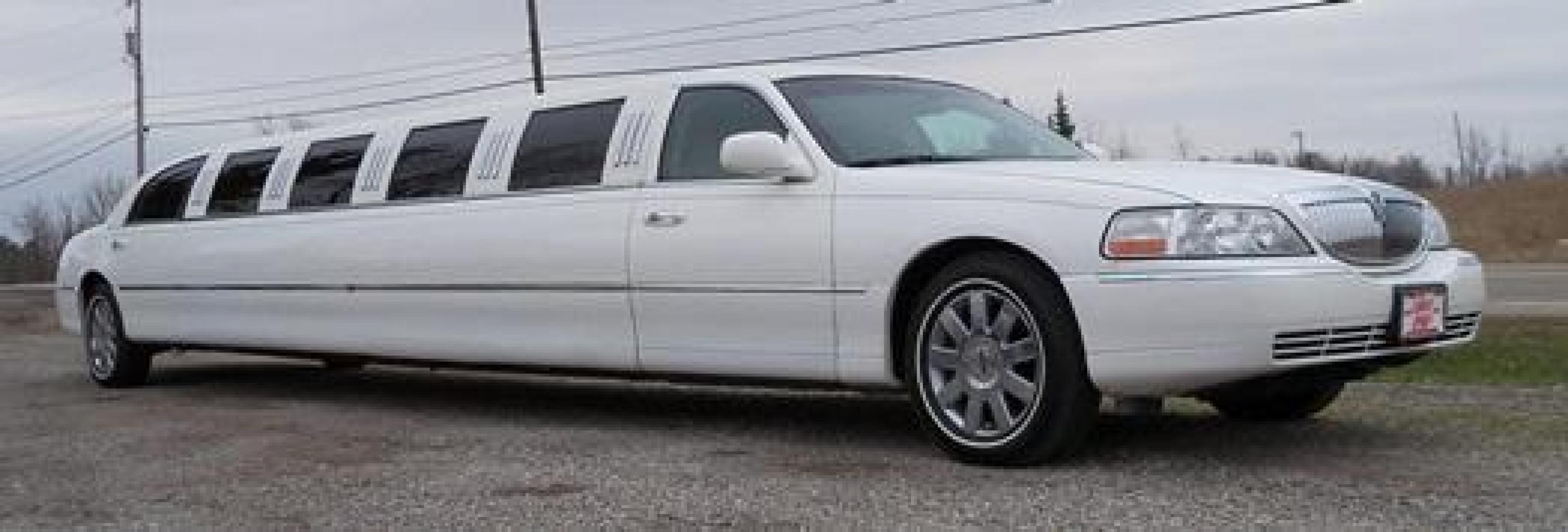 2006 White Lincoln Town Car (1LNHM81V86Y) with an 4.6-Liter 8 Cylinder Engine engine, located at 1725 US-68 N, Bellefontaine, OH, 43311, (937) 592-5466, 40.387783, -83.752388 - 2006 LINCOLN 180” SUPER STRETCH-GREAT LAKES LIMOUSINE White w-2 tone gray J-seat int, 3 7” flat screens TV-AM-FM-CD-DVD, stainless fiber optic ceiling, champagne-ice boxes, deluxe black lacquered bar w-stem & glassware, front, rear controls & dual alternators. Chrome Wheels MAKE OFFER - Photo #2