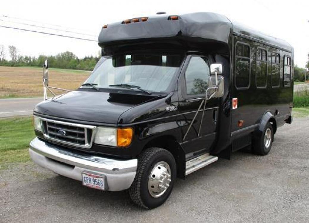 2003 Black Ford E-350 (1FDWE35FX3H) with an 5.4L V8 engine, 4 Speed Automatic with Overdrive transmission, located at 1725 US-68 N, Bellefontaine, OH, 43311, (937) 592-5466, 40.387783, -83.752388 - Photo #0