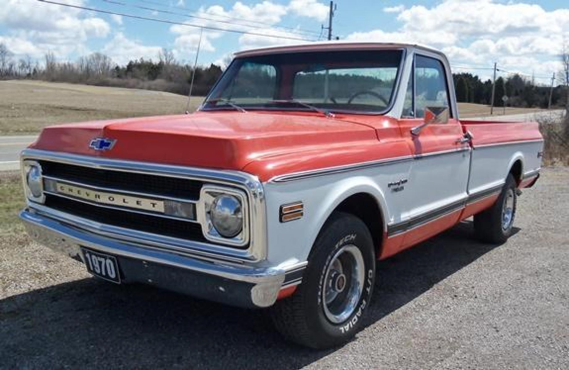 1970 Orange/White Chevrolet C10 with an 328 V8 engine, located at 1725 US-68 N, Bellefontaine, OH, 43311, (937) 592-5466, 40.387783, -83.752388 - 1970 CHEVROLET C10 CUSTOM ½ T Pick-up, High-performance “383 Stroker” V-8 w-headers Auto, Orange w-white Inserts, Black Lth Interior, custom wood steering wheel, PS, PB, Retro AM-FM-CD, gauges, dual exhaust, rally rims w-white letter tires, chrome bumpers & grille, Bed mat.	. Professionally wet - Photo #1