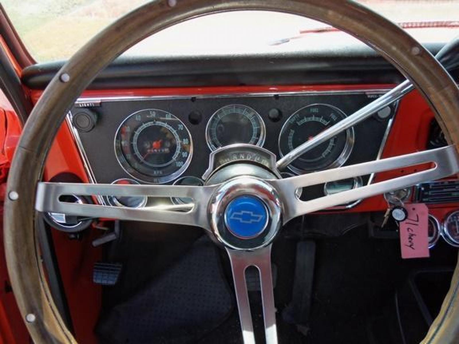 1970 Orange/White Chevrolet C10 with an 328 V8 engine, located at 1725 US-68 N, Bellefontaine, OH, 43311, (937) 592-5466, 40.387783, -83.752388 - 1970 CHEVROLET C10 CUSTOM ½ T Pick-up, High-performance “383 Stroker” V-8 w-headers Auto, Orange w-white Inserts, Black Lth Interior, custom wood steering wheel, PS, PB, Retro AM-FM-CD, gauges, dual exhaust, rally rims w-white letter tires, chrome bumpers & grille, Bed mat.	. Professionally wet - Photo #14