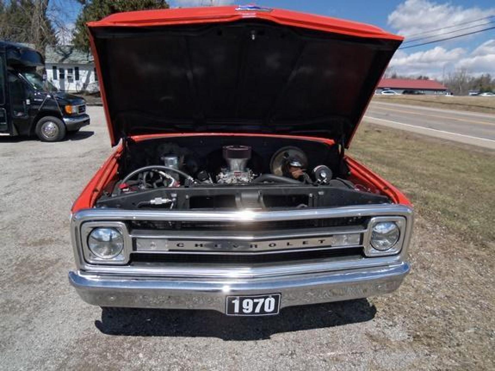 1970 Orange/White Chevrolet C10 with an 328 V8 engine, located at 1725 US-68 N, Bellefontaine, OH, 43311, (937) 592-5466, 40.387783, -83.752388 - 1970 CHEVROLET C10 CUSTOM ½ T Pick-up, High-performance “383 Stroker” V-8 w-headers Auto, Orange w-white Inserts, Black Lth Interior, custom wood steering wheel, PS, PB, Retro AM-FM-CD, gauges, dual exhaust, rally rims w-white letter tires, chrome bumpers & grille, Bed mat.	. Professionally wet - Photo #19