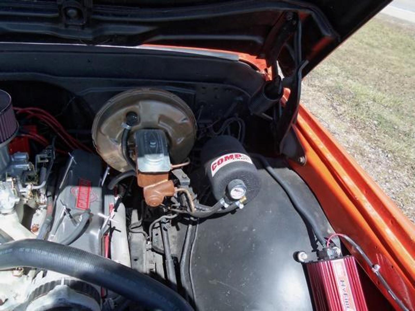 1970 Orange/White Chevrolet C10 with an 328 V8 engine, located at 1725 US-68 N, Bellefontaine, OH, 43311, (937) 592-5466, 40.387783, -83.752388 - 1970 CHEVROLET C10 CUSTOM ½ T Pick-up, High-performance “383 Stroker” V-8 w-headers Auto, Orange w-white Inserts, Black Lth Interior, custom wood steering wheel, PS, PB, Retro AM-FM-CD, gauges, dual exhaust, rally rims w-white letter tires, chrome bumpers & grille, Bed mat.	. Professionally wet - Photo #21