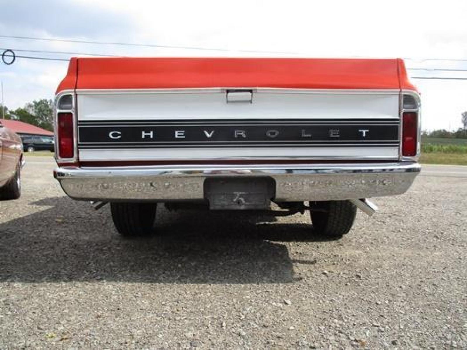 1970 Orange/White Chevrolet C10 with an 328 V8 engine, located at 1725 US-68 N, Bellefontaine, OH, 43311, (937) 592-5466, 40.387783, -83.752388 - 1970 CHEVROLET C10 CUSTOM ½ T Pick-up, High-performance “383 Stroker” V-8 w-headers Auto, Orange w-white Inserts, Black Lth Interior, custom wood steering wheel, PS, PB, Retro AM-FM-CD, gauges, dual exhaust, rally rims w-white letter tires, chrome bumpers & grille, Bed mat.	. Professionally wet - Photo #26