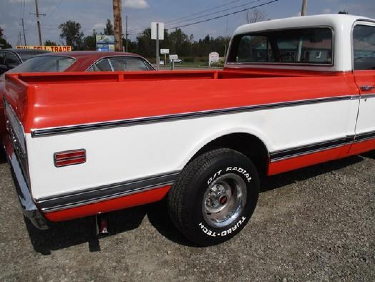 1970 Orange/White Chevrolet C10 with an 328 V8 engine, located at 1725 US-68 N, Bellefontaine, OH, 43311, (937) 592-5466, 40.387783, -83.752388 - 1970 CHEVROLET C10 CUSTOM ½ T Pick-up, High-performance “383 Stroker” V-8 w-headers Auto, Orange w-white Inserts, Black Lth Interior, custom wood steering wheel, PS, PB, Retro AM-FM-CD, gauges, dual exhaust, rally rims w-white letter tires, chrome bumpers & grille, Bed mat.	. Professionally wet - Photo #27