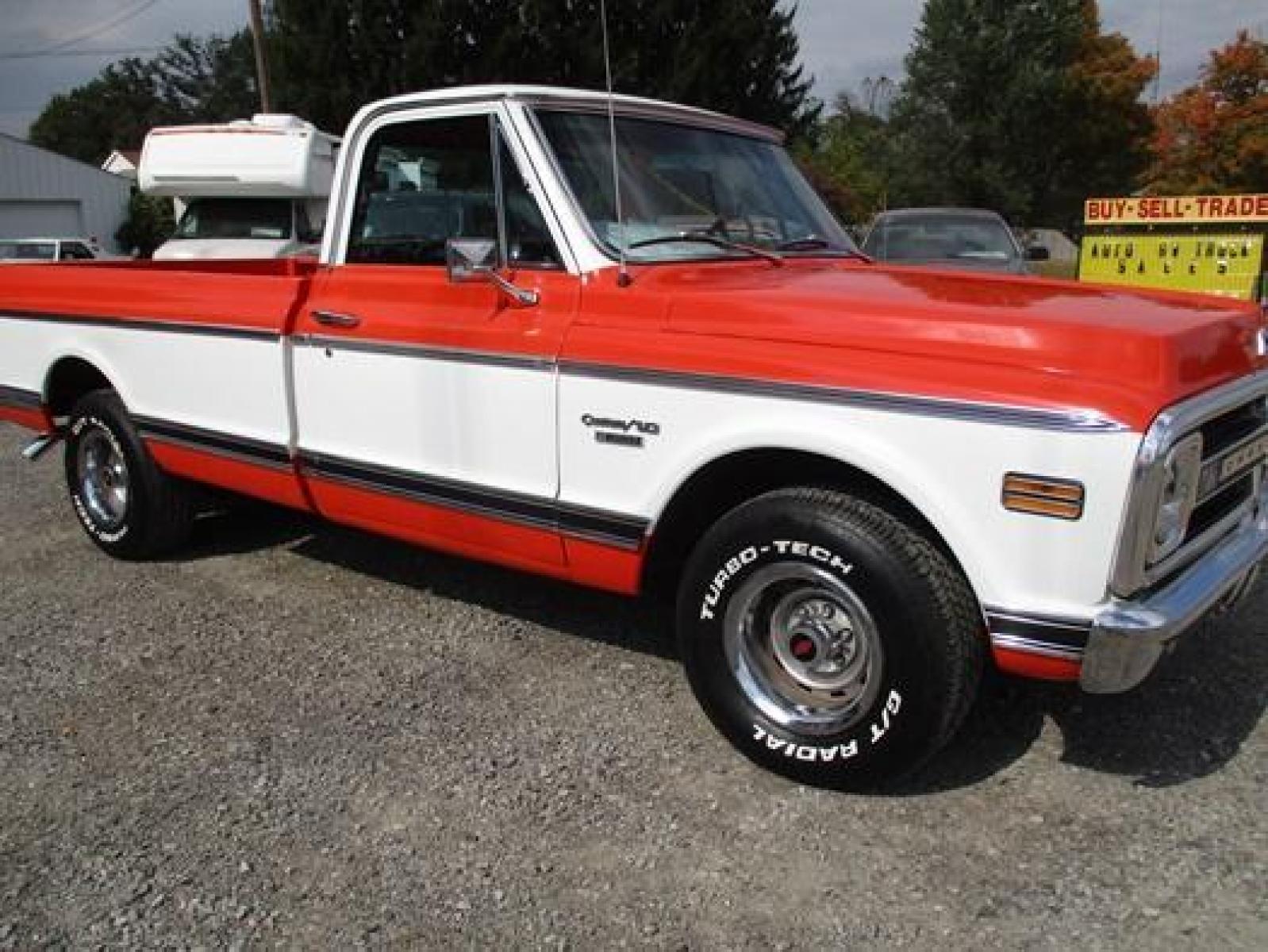 1970 Orange/White Chevrolet C10 with an 328 V8 engine, located at 1725 US-68 N, Bellefontaine, OH, 43311, (937) 592-5466, 40.387783, -83.752388 - 1970 CHEVROLET C10 CUSTOM ½ T Pick-up, High-performance “383 Stroker” V-8 w-headers Auto, Orange w-white Inserts, Black Lth Interior, custom wood steering wheel, PS, PB, Retro AM-FM-CD, gauges, dual exhaust, rally rims w-white letter tires, chrome bumpers & grille, Bed mat.	. Professionally wet - Photo #28