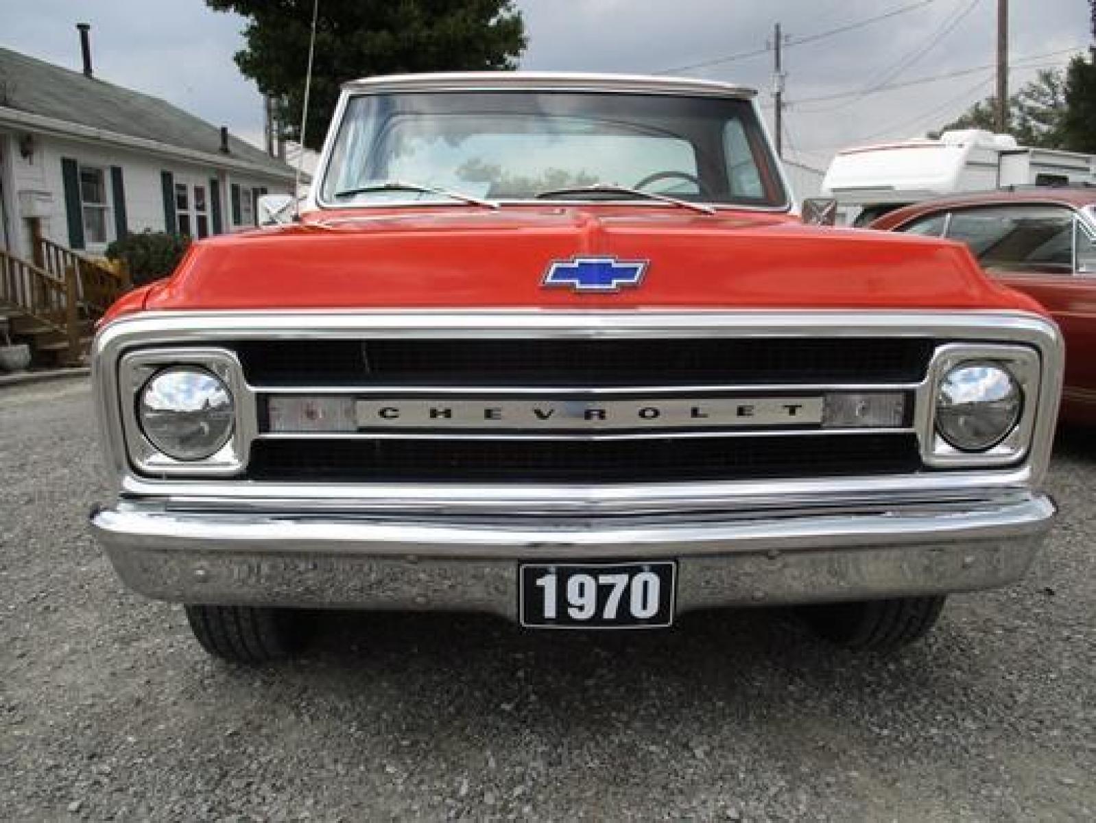 1970 Orange/White Chevrolet C10 with an 328 V8 engine, located at 1725 US-68 N, Bellefontaine, OH, 43311, (937) 592-5466, 40.387783, -83.752388 - 1970 CHEVROLET C10 CUSTOM ½ T Pick-up, High-performance “383 Stroker” V-8 w-headers Auto, Orange w-white Inserts, Black Lth Interior, custom wood steering wheel, PS, PB, Retro AM-FM-CD, gauges, dual exhaust, rally rims w-white letter tires, chrome bumpers & grille, Bed mat.	. Professionally wet - Photo #29