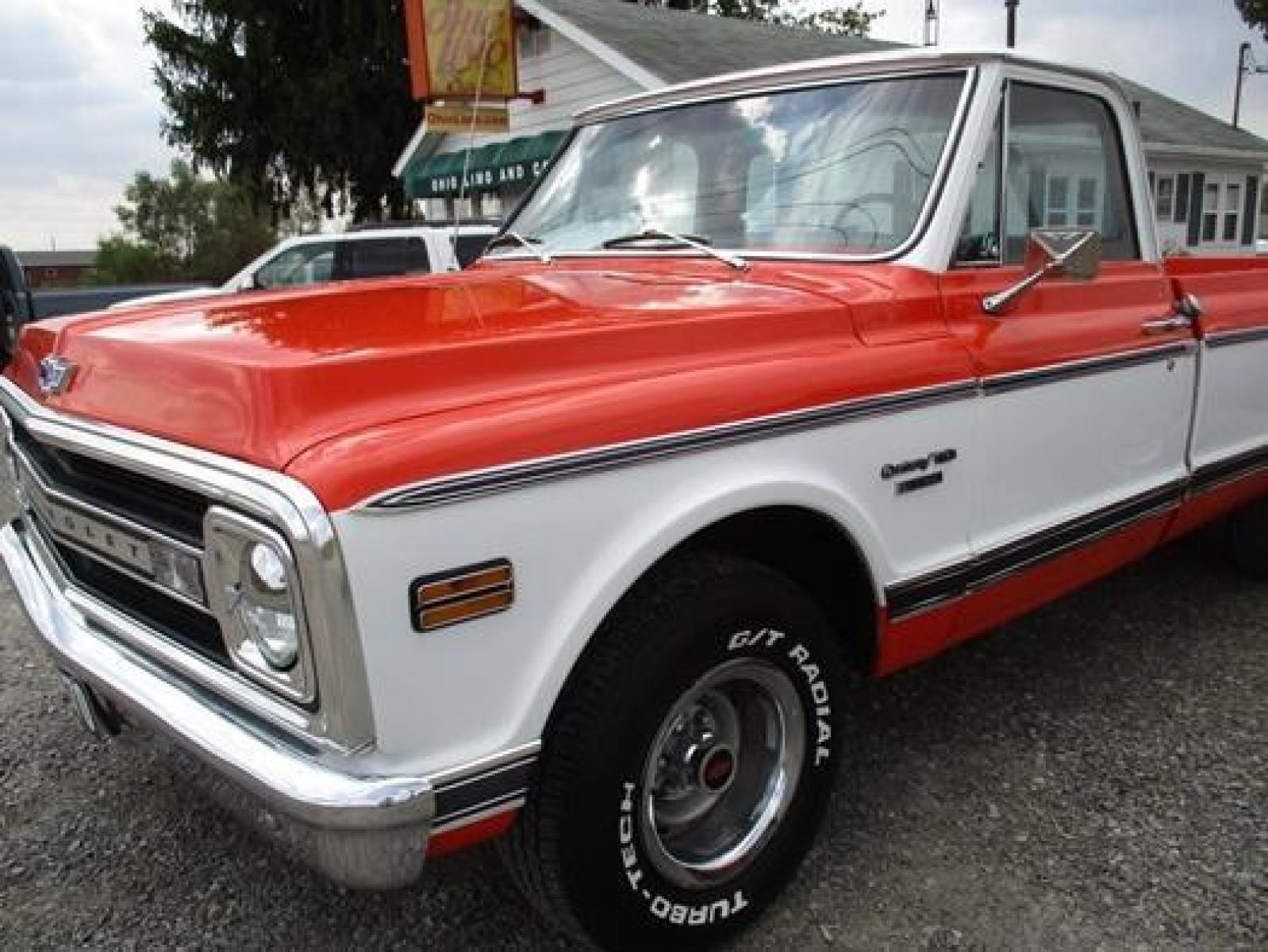 1970 Orange/White Chevrolet C10 with an 328 V8 engine, located at 1725 US-68 N, Bellefontaine, OH, 43311, (937) 592-5466, 40.387783, -83.752388 - 1970 CHEVROLET C10 CUSTOM ½ T Pick-up, High-performance “383 Stroker” V-8 w-headers Auto, Orange w-white Inserts, Black Lth Interior, custom wood steering wheel, PS, PB, Retro AM-FM-CD, gauges, dual exhaust, rally rims w-white letter tires, chrome bumpers & grille, Bed mat.	. Professionally wet - Photo #30