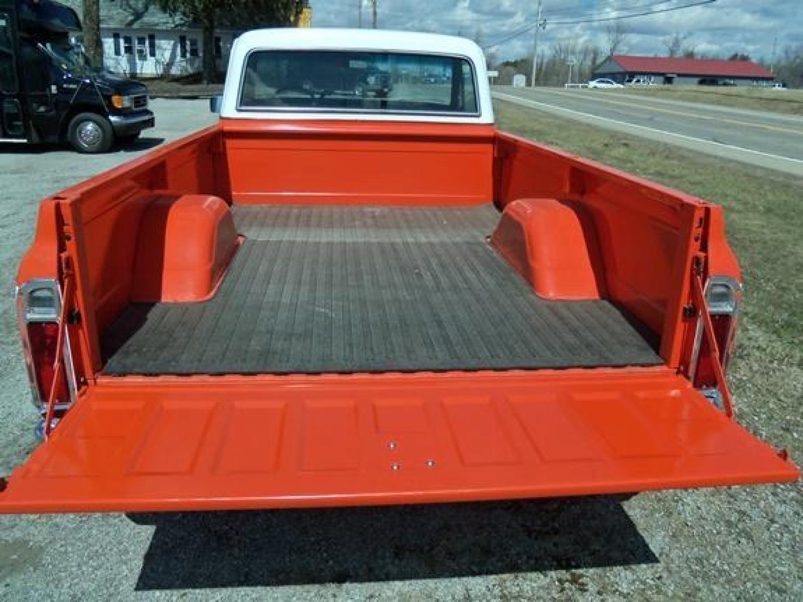 1970 Orange/White Chevrolet C10 with an 328 V8 engine, located at 1725 US-68 N, Bellefontaine, OH, 43311, (937) 592-5466, 40.387783, -83.752388 - 1970 CHEVROLET C10 CUSTOM ½ T Pick-up, High-performance “383 Stroker” V-8 w-headers Auto, Orange w-white Inserts, Black Lth Interior, custom wood steering wheel, PS, PB, Retro AM-FM-CD, gauges, dual exhaust, rally rims w-white letter tires, chrome bumpers & grille, Bed mat.	. Professionally wet - Photo #8